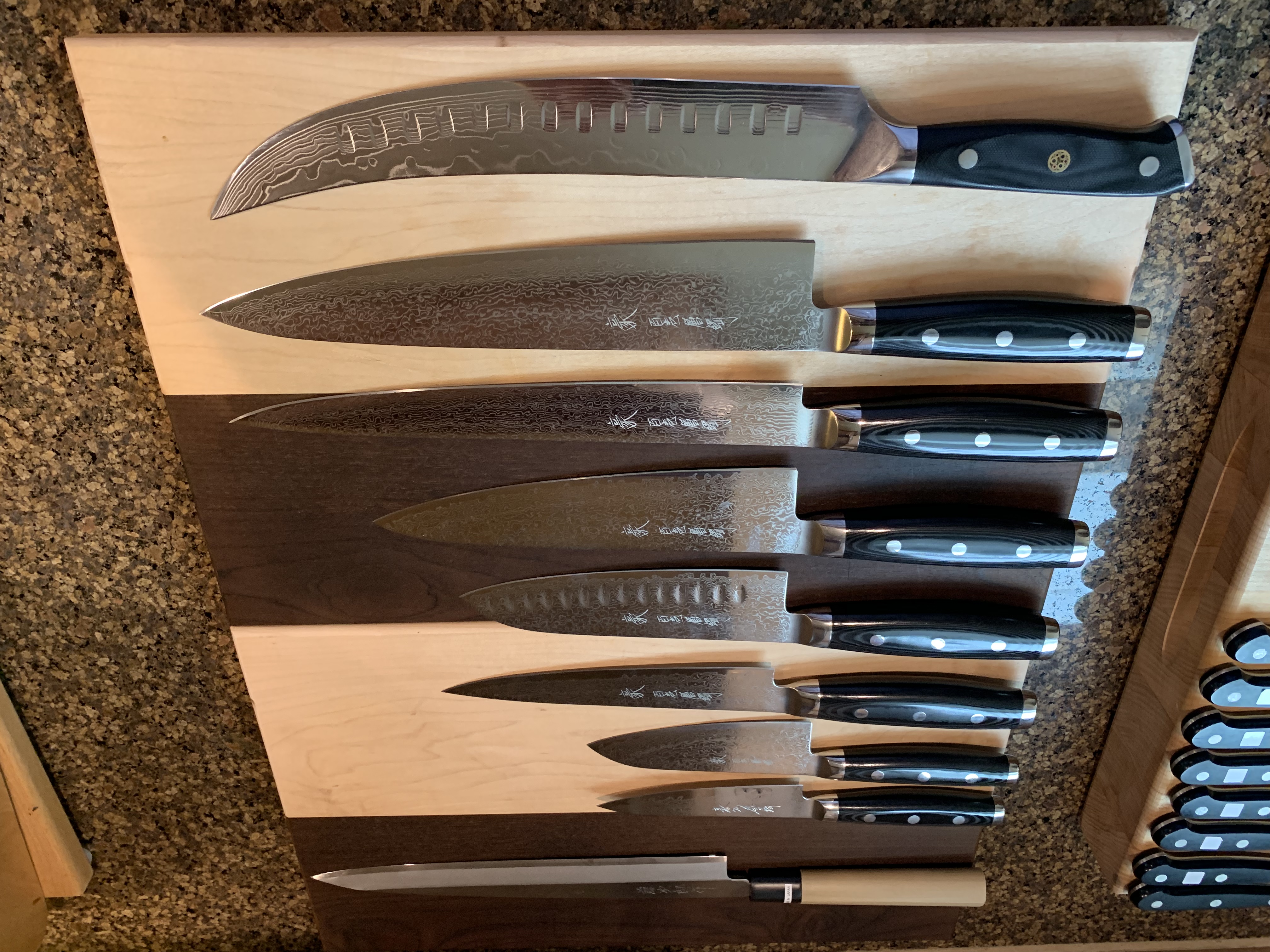 SG2 steel Yaxell Gou Knife Clearance - 10" Slicer - $149.99, 6.5" hollow ground Santoku - $129.99, 6" utility $99.99 and more