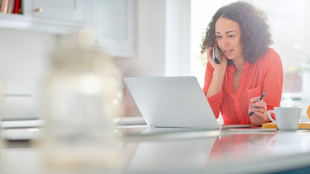 a woman speaks to a student loan refinancing rep