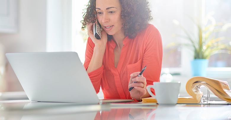 a woman speaks to a student loan refinancing rep