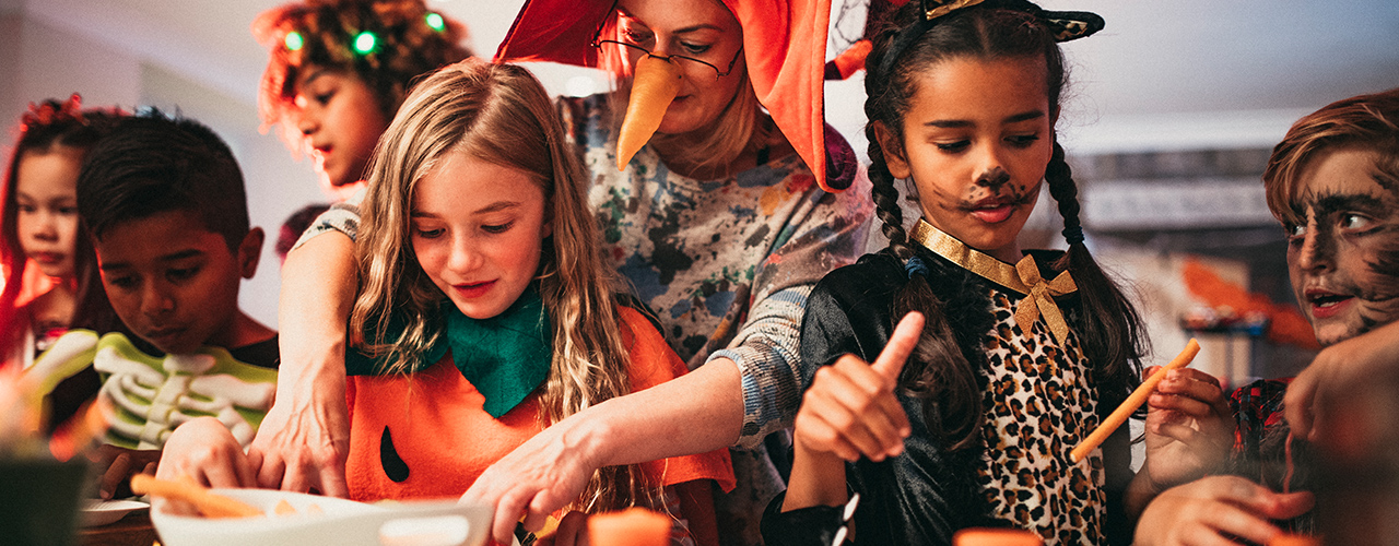 children gather at a halloween party