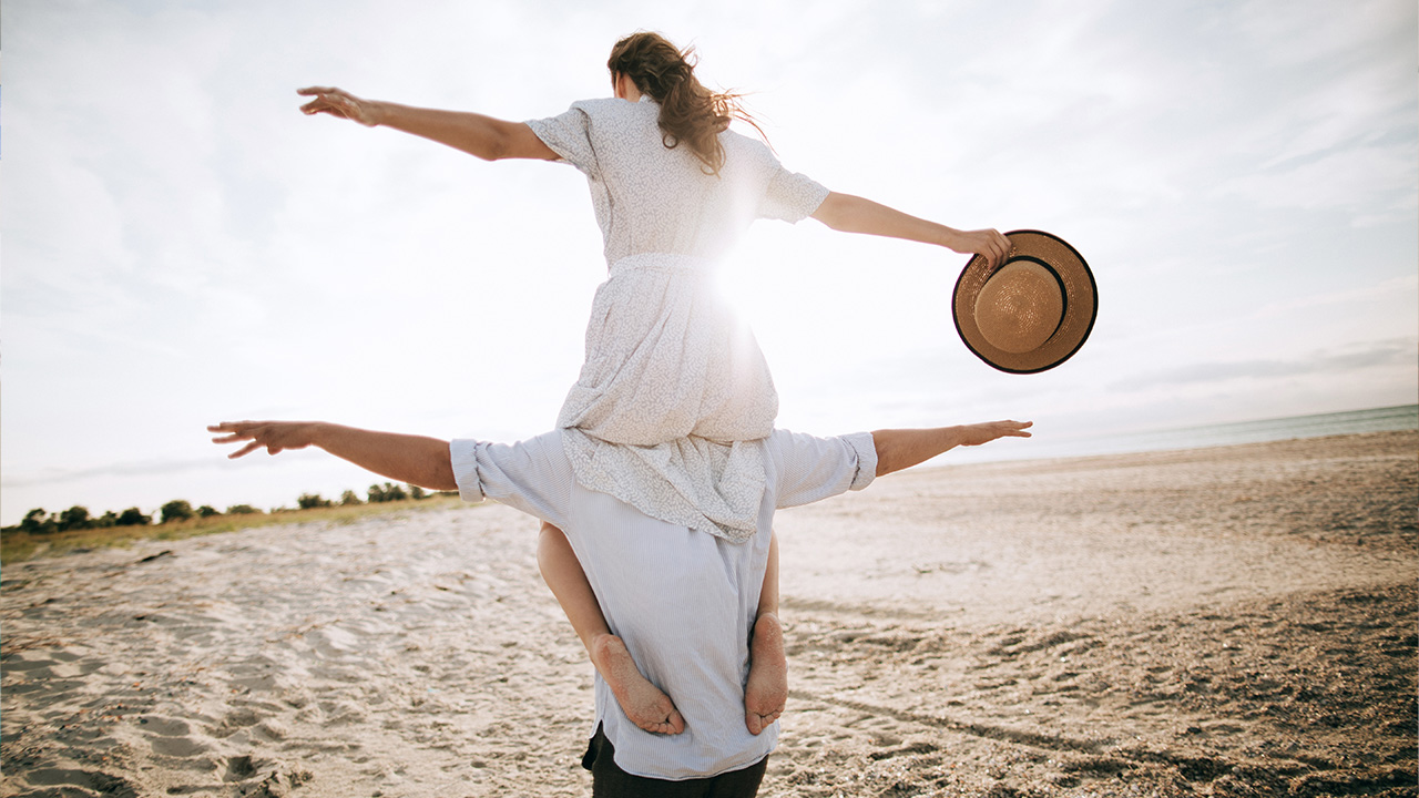 happy people near the ocean