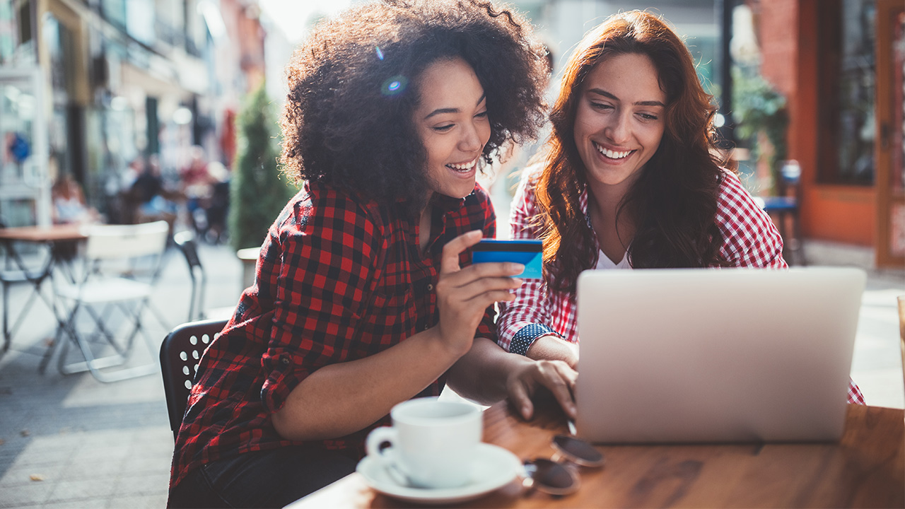 two friends shopping online