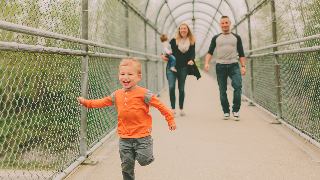 family walks outdoors