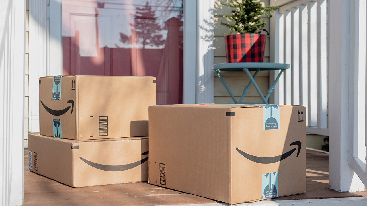 amazon packages rest by the front door
