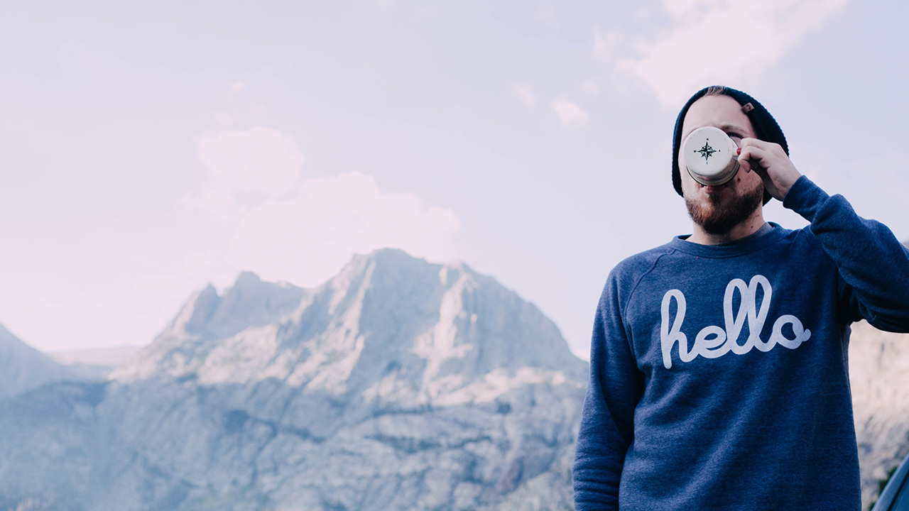 coffee drinker in the mountains