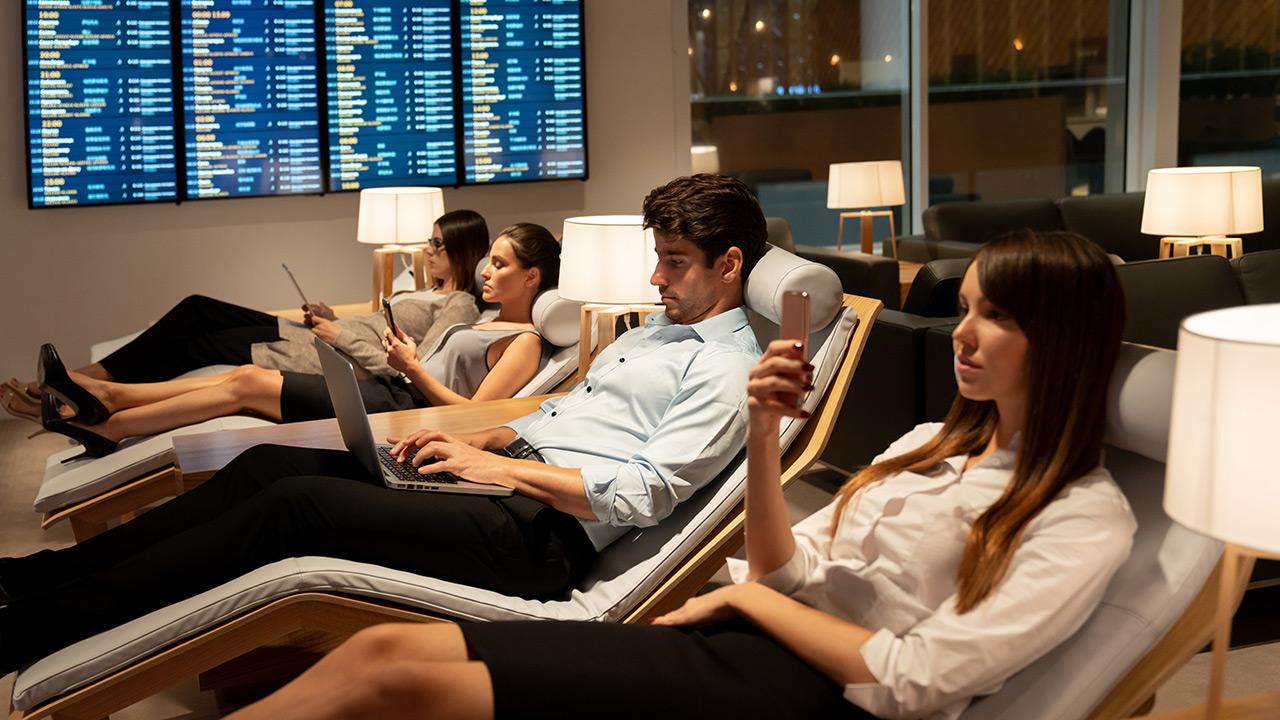 people relaxing before a flight