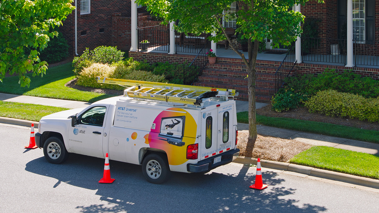 cable provider van in front of a house