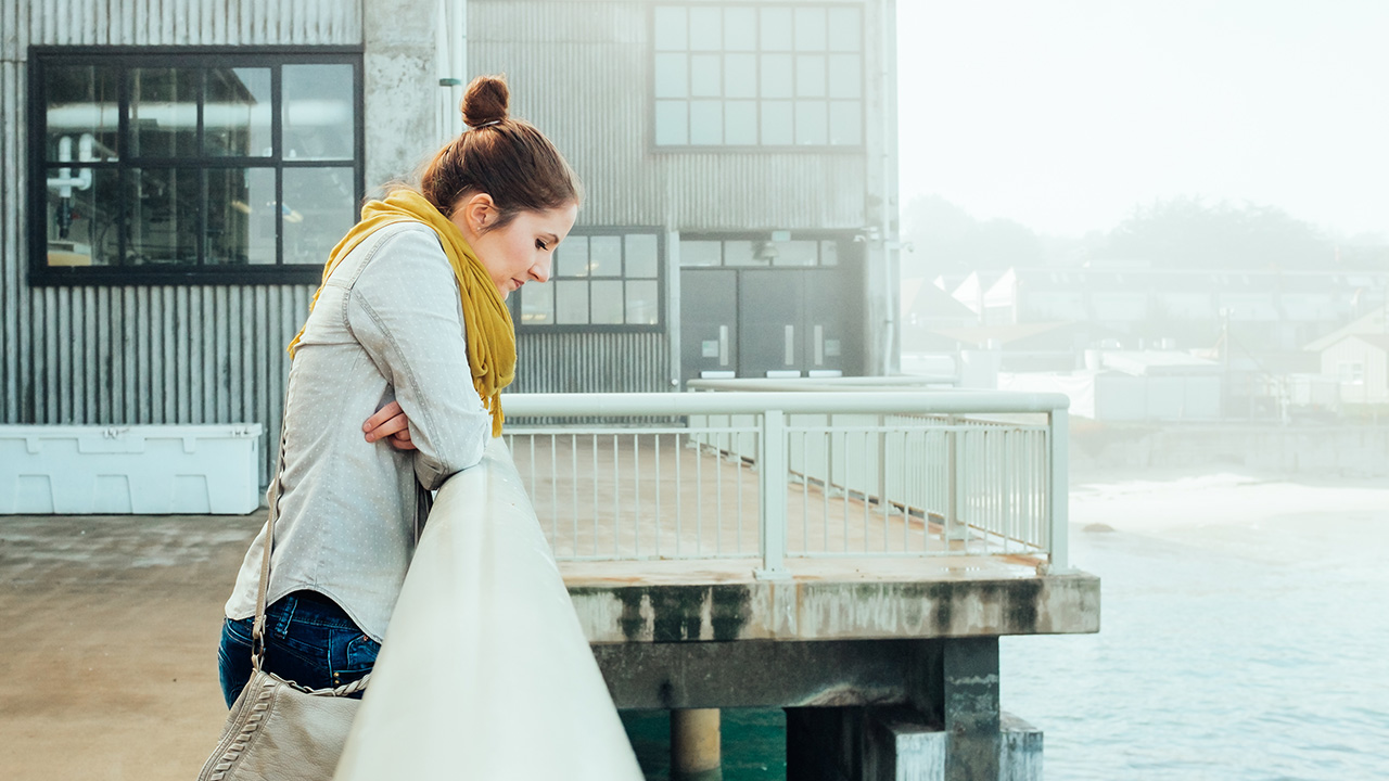 woman looks at the sea