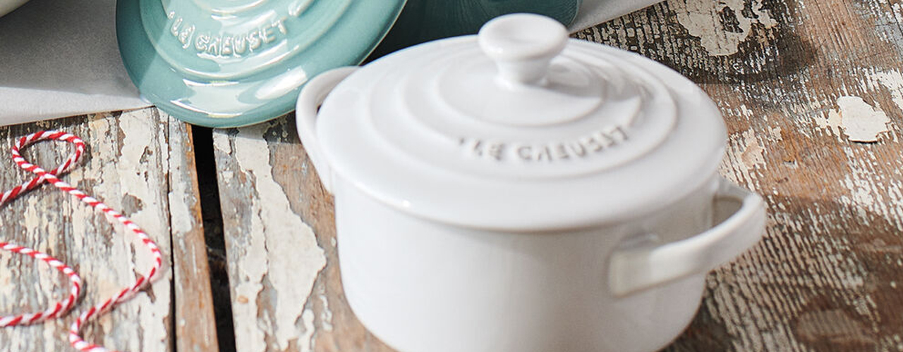 small-white-crockpot-on-floured-table