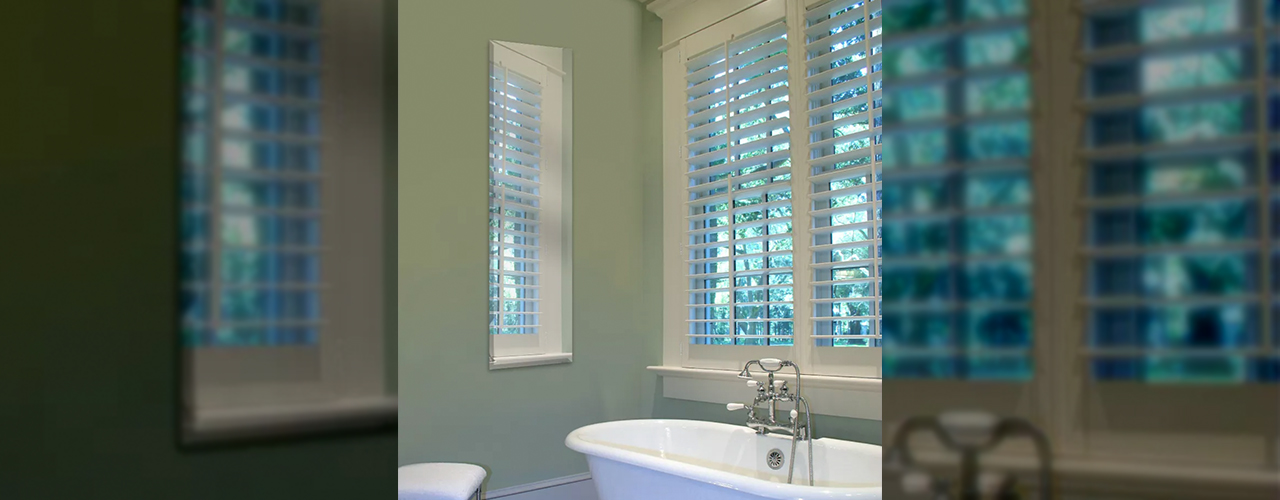 frameless-mirror-hanging-in-bathroom