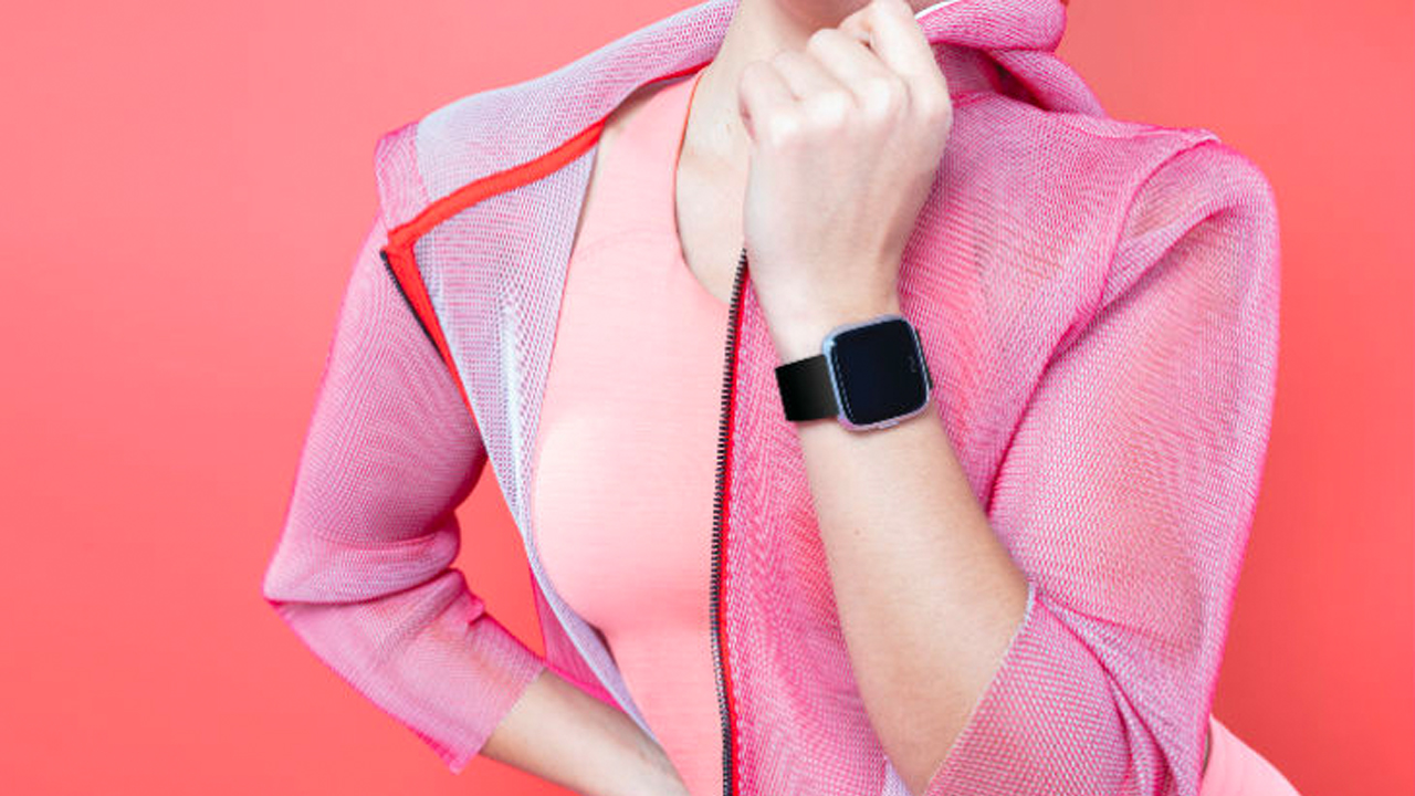 woman fitbit pink outfit