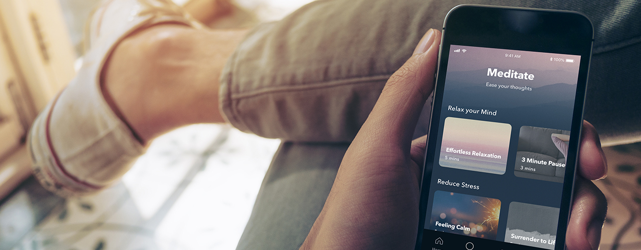 man-using-simple-habit-meditation-app-on-smartphone