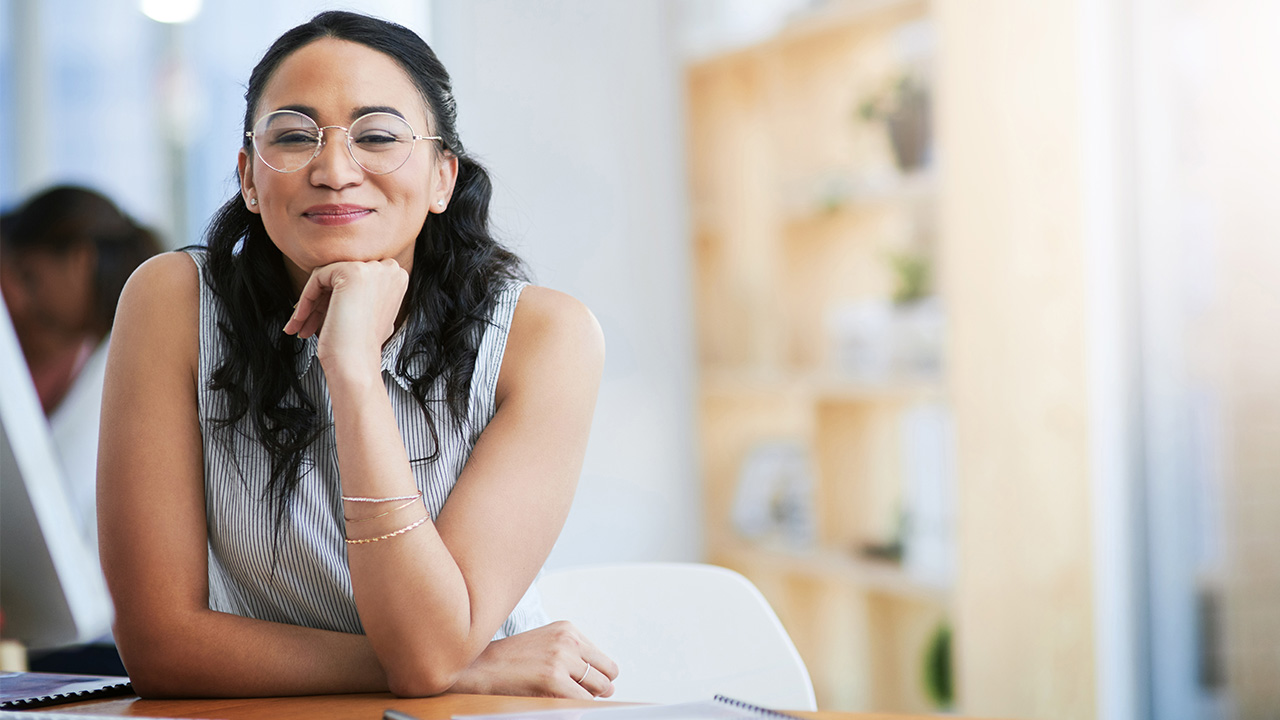 happy person at a desk