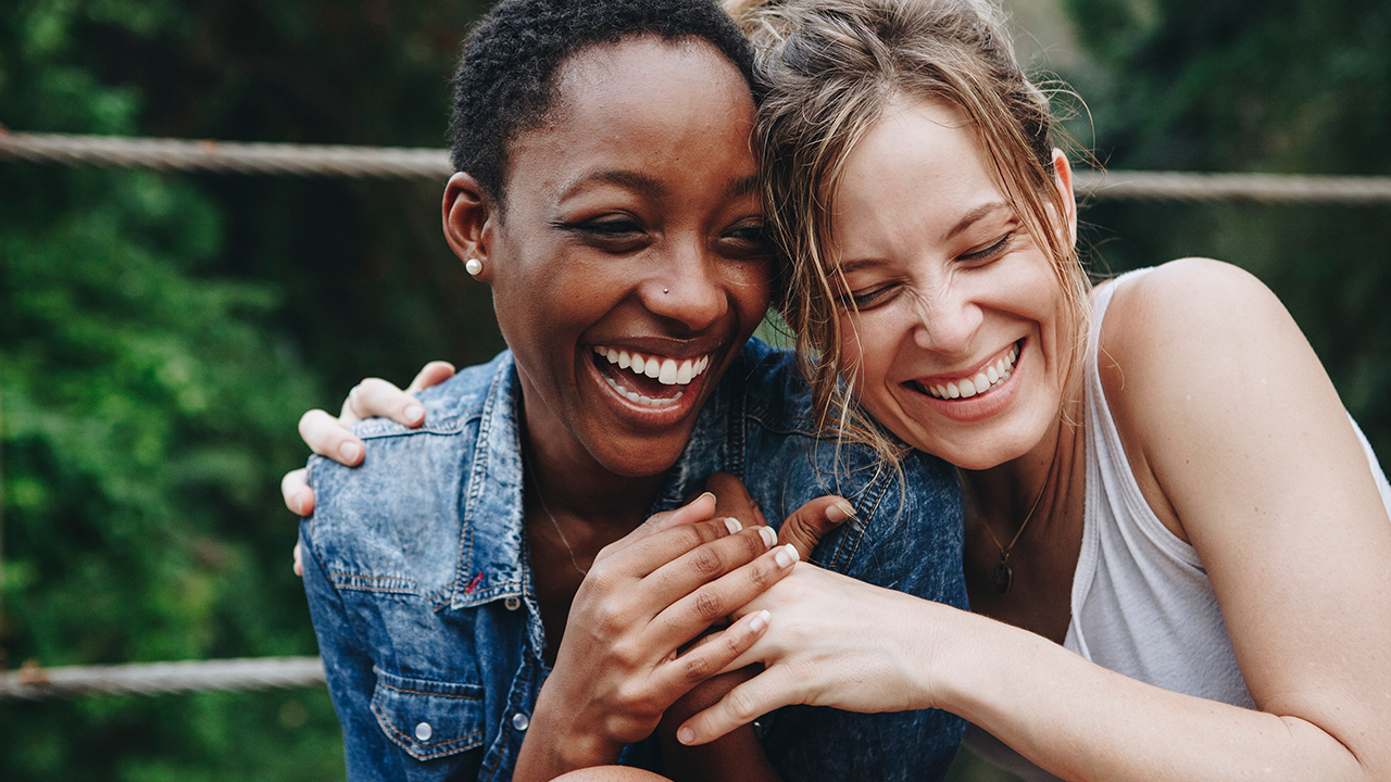 two women smiling