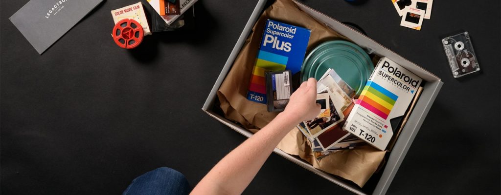 Legacybox being filled by person
