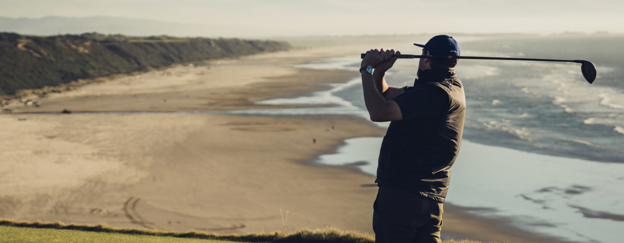 man golfing