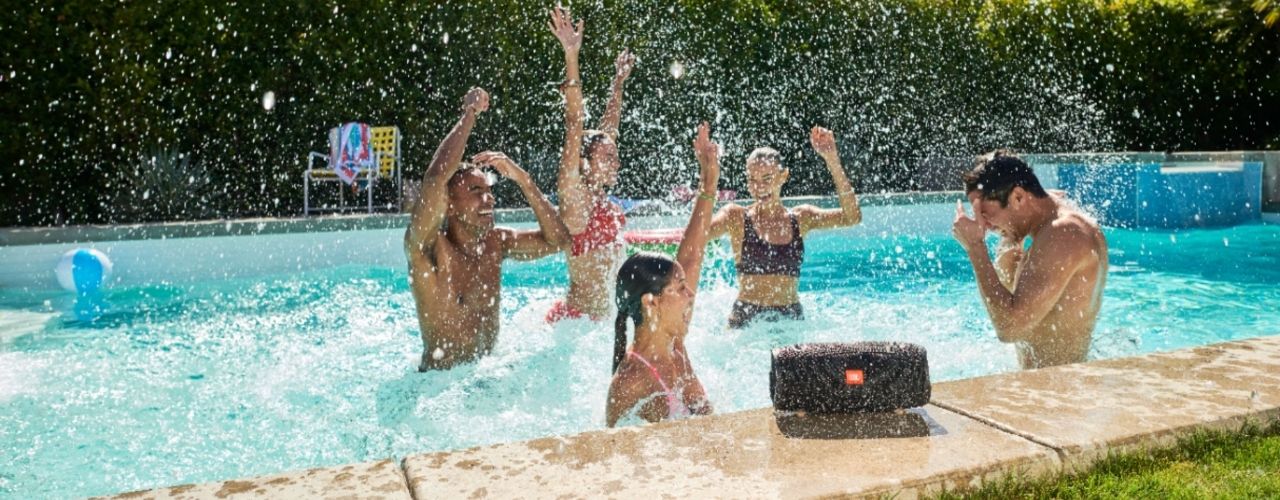 people swimming listening to music