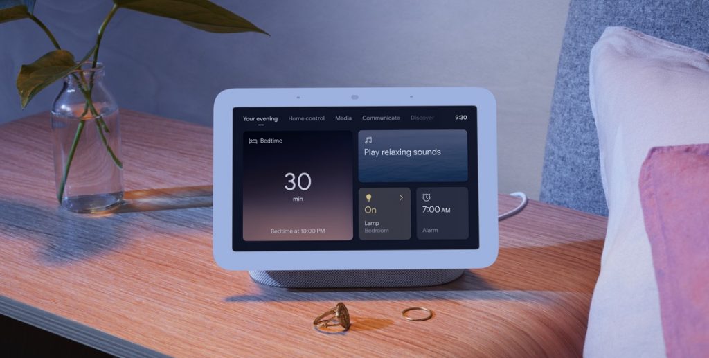 Nest Hub on a night stand in the evening
