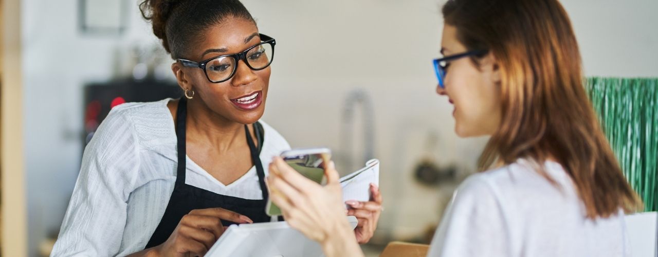 Customer using online coupon from smartphone app