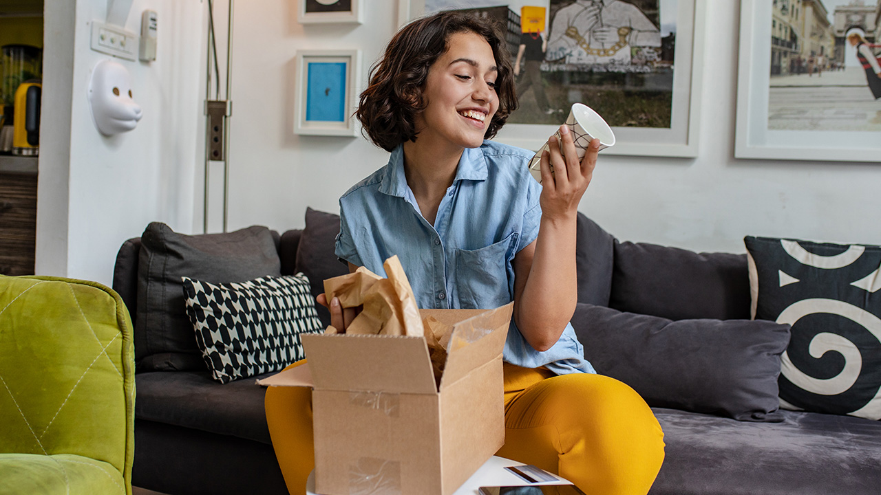 woman unpacking a box