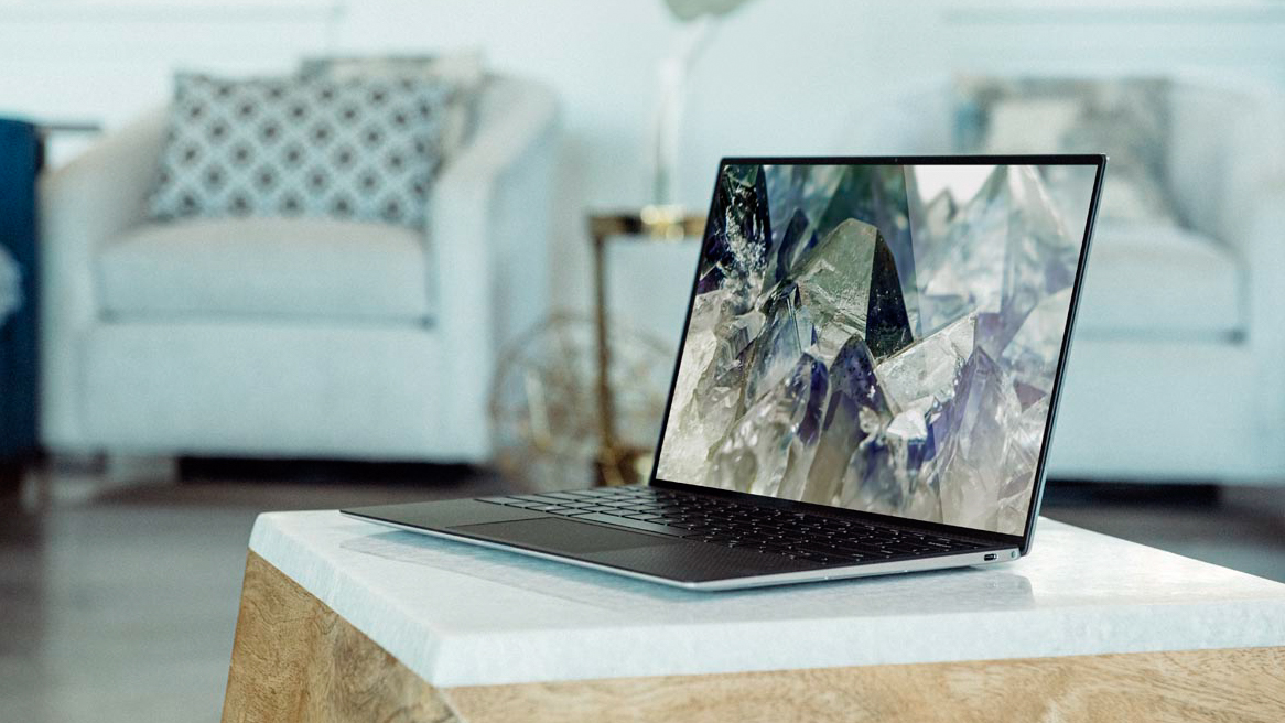 Dell xps 13 laptop on a side table