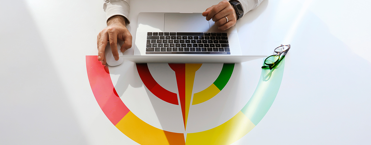 People Using Laptop and Credit Score Concept on Table inbody