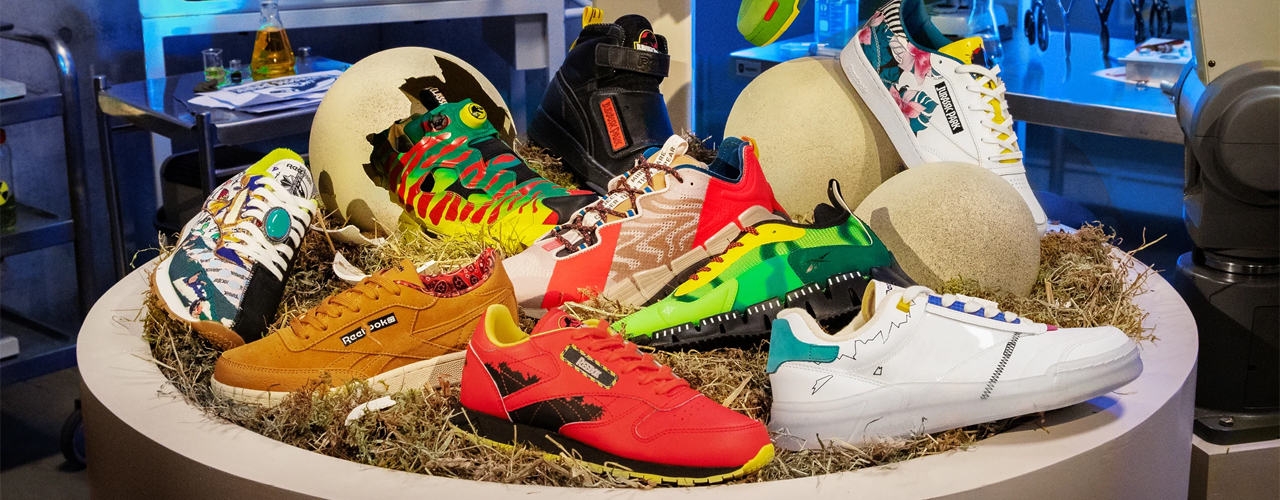 reebok JURASSIC PARK COLLECTION of shoes on table in room