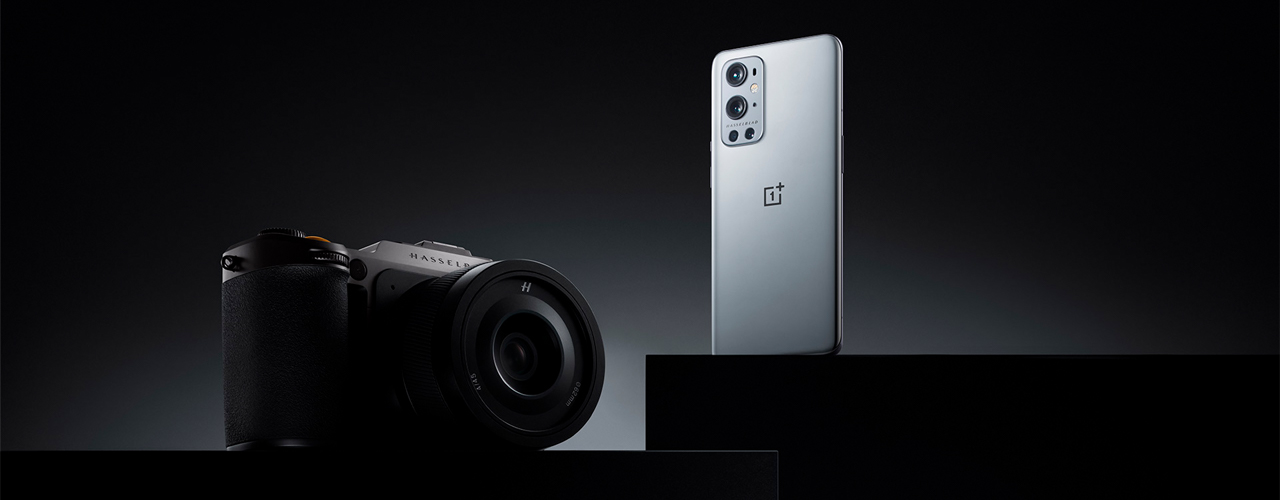 one plus 9 pro and hassleblad camera on black background