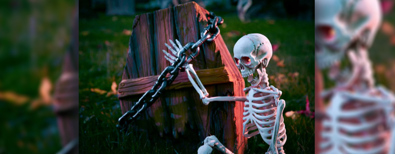 5 ft. Hanging Plastic Posable Skeleton Decoration with LED Eyes