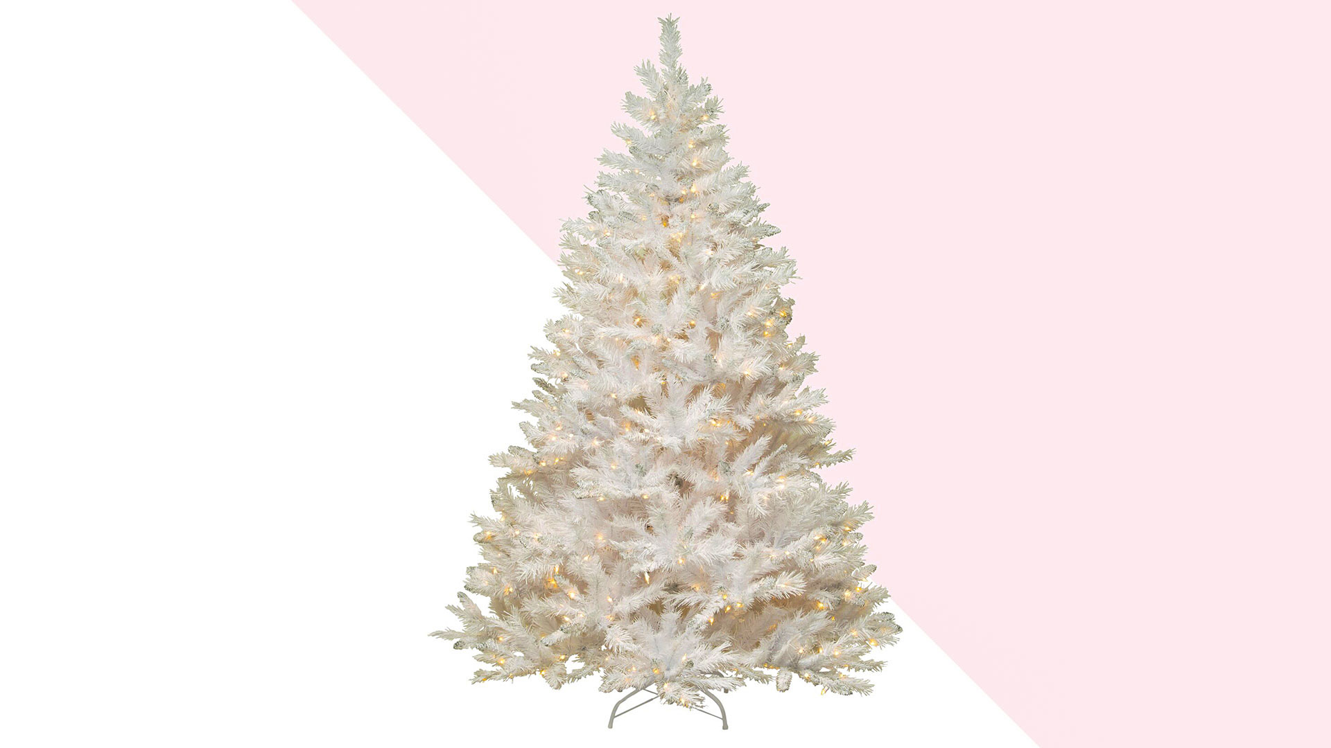 Glittery White Artificial Fir Christmas Tree with Lights on pink background