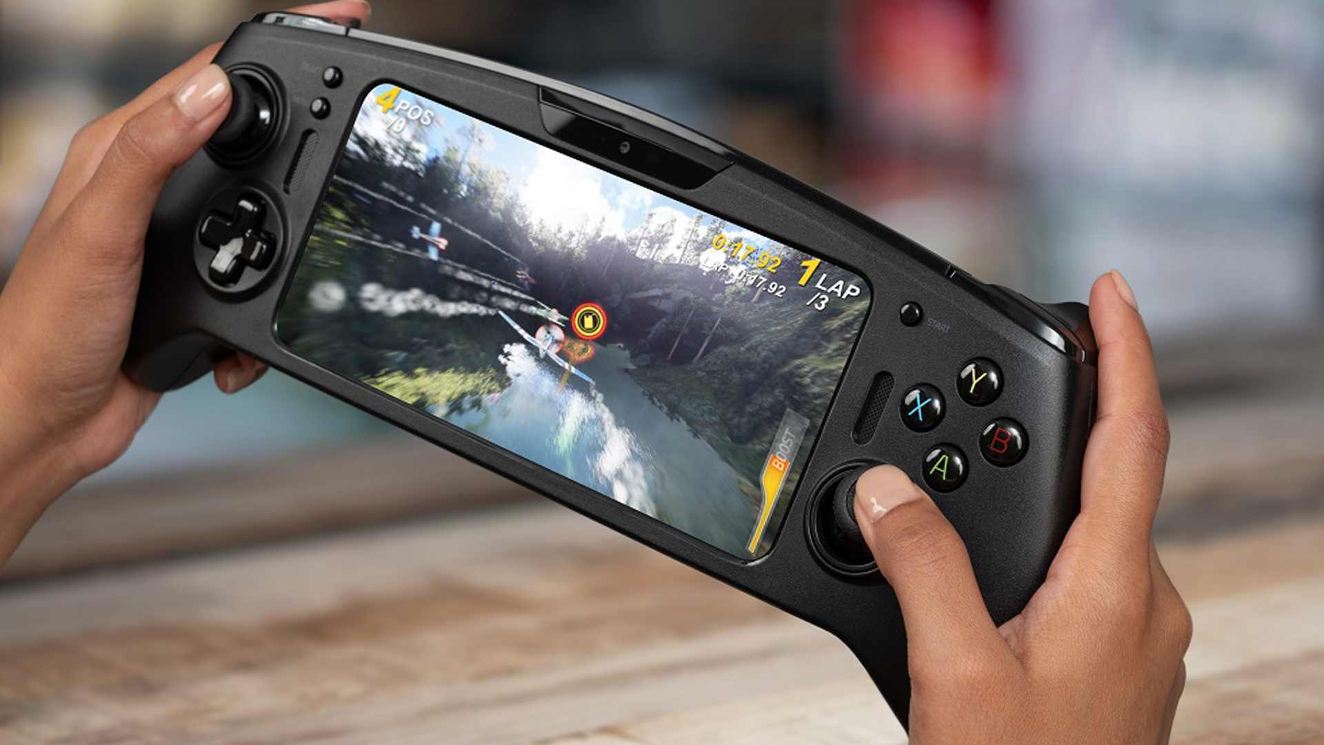 hands holding Razer/Qualcomm gaming device